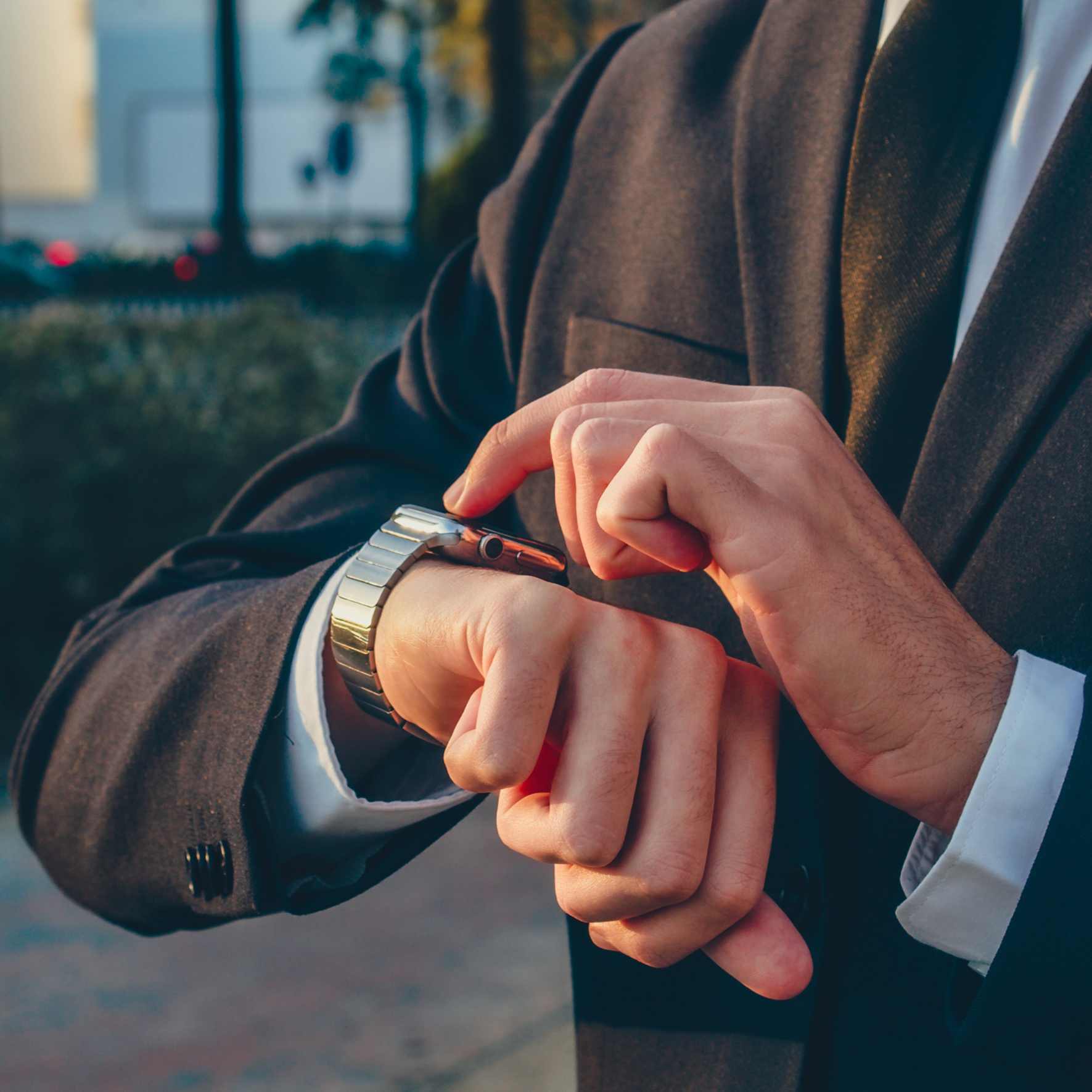 A lawyer checking his watch